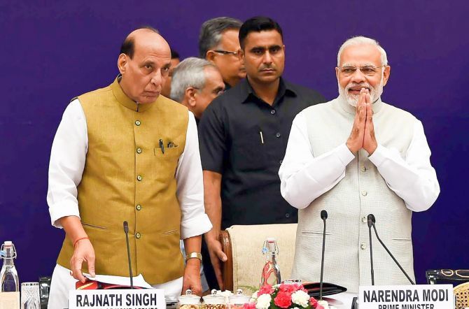 Prime Minister Narendra D Modi, right, with Home Minister Rajnath Singh at the NITI Aayog governing council meeting in New Delhi June 17, 2018. Photograph: PTI Photo