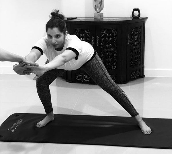 Sania Mirza practises pre-natal yoga