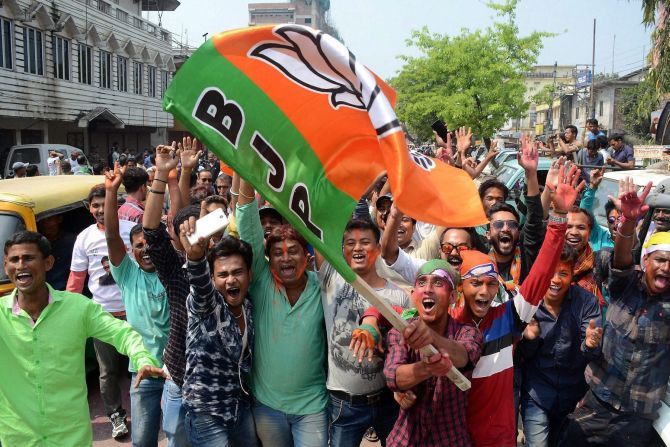 BJP supporters celebrate the party's victory in Agartala, March 3, 2018. Photograph: PTI Photo