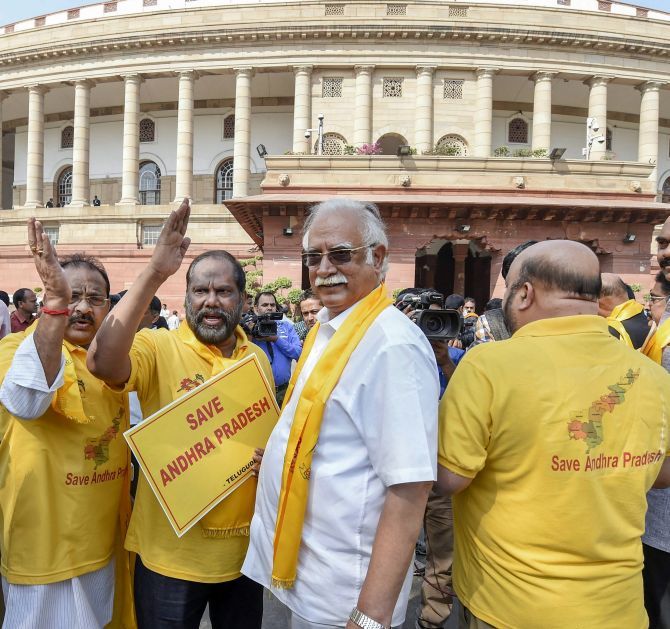 TDP MPs, including former civil aviation minister Ashok Gajapathi Raju, protest outside Parliament demanding special status for Andhra Pradesh, March 9, 2018. Photograph: Kamal Singh/PTI Photo