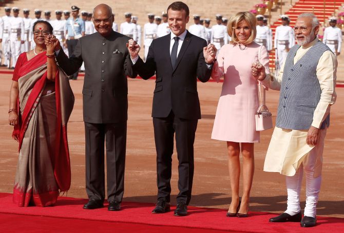 French President Emmanuel Macron and his wife Brigitte Marie-Claude Macron at the ceremonial welcome at Rashtrapati Bhavan, March 10, 2018. The French leader and the first lady are flanked by President Ram Nath Kovind, First Lady Savita Kovind and Prime Minister Narendra D Modi. Photograph: Adnan Abidi/Reuters