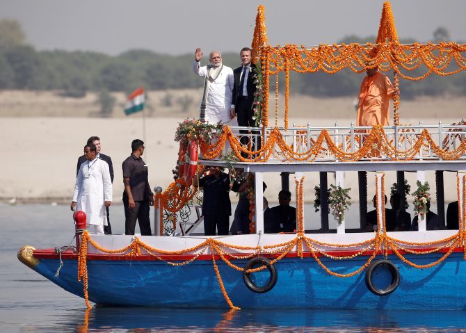 Prime Minister Narendra D Modi and French President Emmanuel Macron enjoy a boat ride on the Ganga in Varanasi, March 12, 2018. Photograph: Adnan Abidi/Reuters
