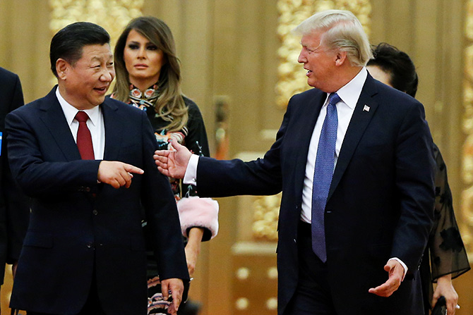 US President Donald J Trump and China's President Xi Jinping at a state dinner at the Great Hall of the People in Beijing, November 9, 2017. Photograph: Thomas Peter/Reuters