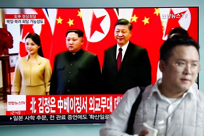 Seoul, March 28, 2018: South Korean television broadcasts a report on North Korean leader Kim Jong-un's meeting with China's supreme leader Xi Jinping in Beijing. Photograph: Kim Hong-Ji/Reuters
