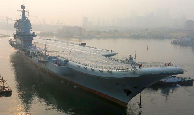 China's First Home-built Aircraft Carrier Begins Sea Trials - Rediff ...