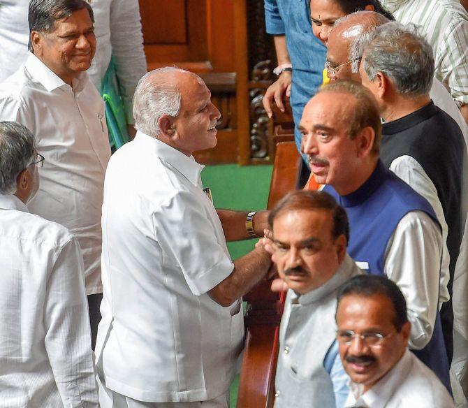 B S Yedyurappa with senior Congress leaders Mallikarjun Kharge, Ashok Gehlot and Ghulam Nabi Azad after he announced his resignation. Also seen: Union Ministers Ananth Kumar and Sadanand Gowda. Photograph: Shailendra Bhojak/PTI Photo