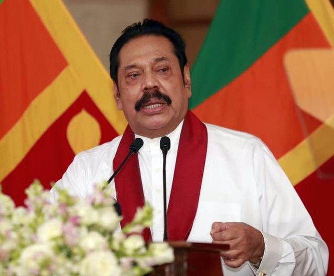 Mahinda quits as PM, troops out, curfew across Lanka