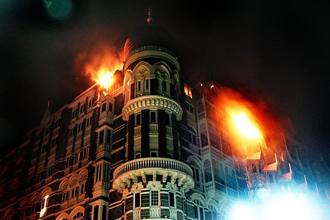 Fire erupts from hotel Taj as terrorists firing in the hotel. Photograph Uttam Ghosh
