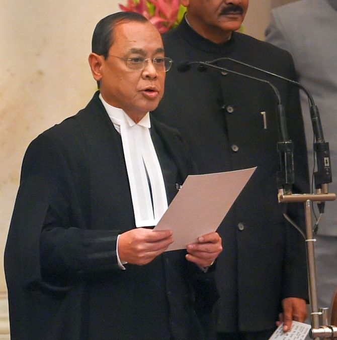 Justice Ranjan Gogoi takes his oath of office as the 46th Chief Justice of India at Rashtrapati Bhavan, October 3, 2018. Photograph: Shahbaz Khan/PTI Photo