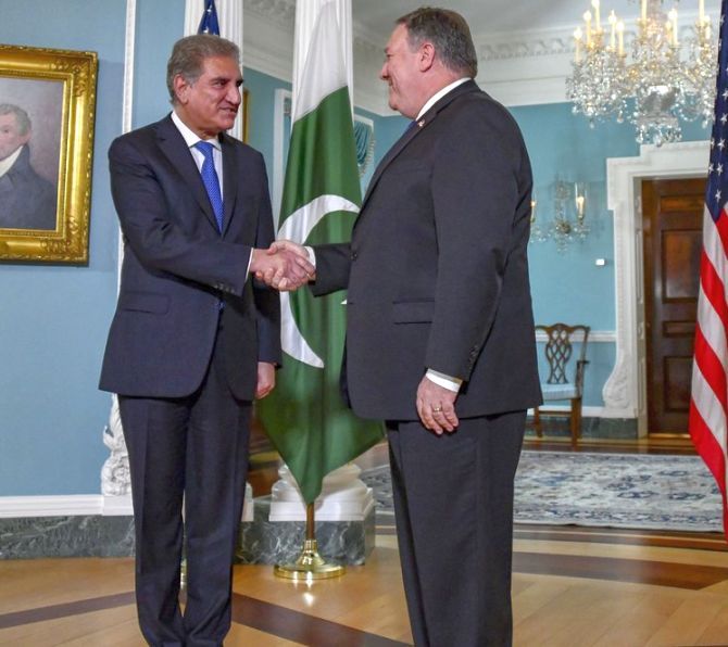Pakistan's Foreign Minister Shah Mahmood Qureshi, left, with United States Secretary of State Mike Pompeo at the US state department. Photograph: Kind courtesy @statedeptspox/Twitter