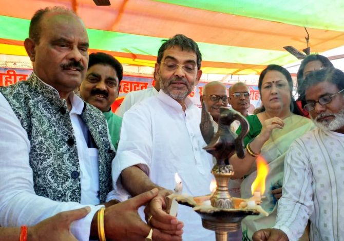 Rashtriya Lok Samata Party supremo and Union Minister Upendra Kushwaha, centre, with RLSP Working President Nagmani, left, at an event in Patna. Photograph: Kind courtesy @UpendraRLSP/Twitter