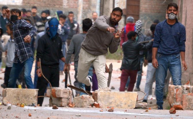Despite heavy security, protestors clashed with security personnel during the municipal elections in the Kashmir valley, October 16, 2018. Photograph: Umar Ganie for Rediff.com