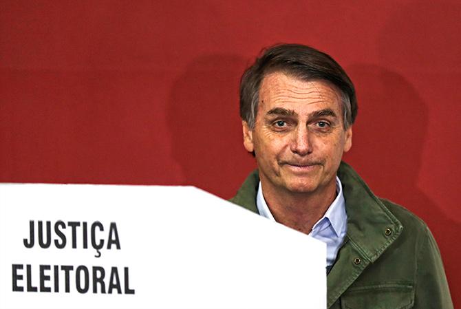 Jair Bolsonaro casts his vote, in Rio de Janeiro, October 28, 2018. Photograph: Ricardo Moraes/Reuters