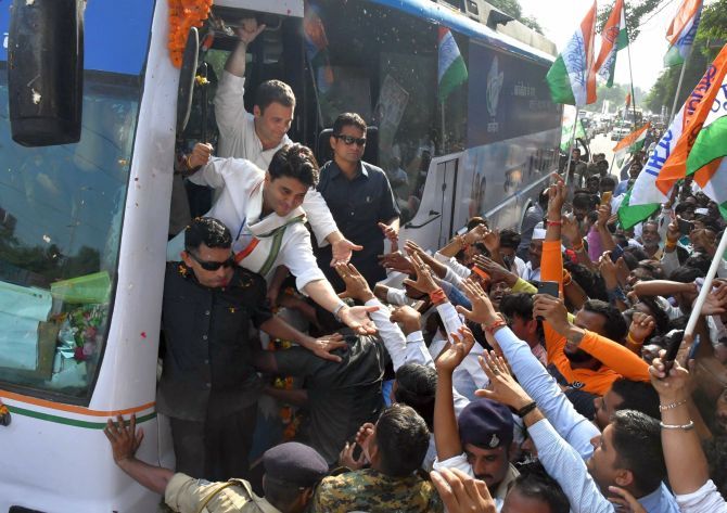 Congress President Rahul Gandhi on a road show during the election campaign in Madhya Pradesh. Photograph: PTI Photo