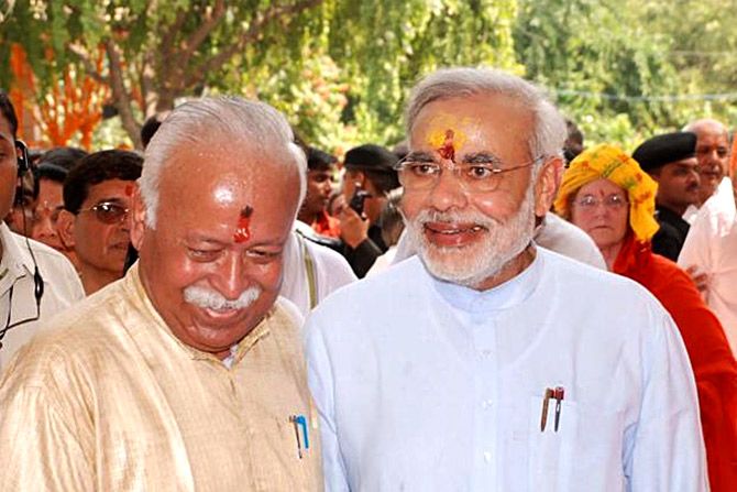 RSS Sarsanghchalak Dr Mohan Bhagwat, left, with then Gujarat chief minister Narendra Damodardas Modi. Photograph: PTI