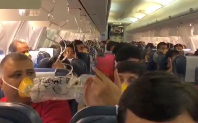 The scene on the Mumbai-Jaipur flight after the crew forgot to select the bleed switch due to which cabin pressurisation could not be maintained and oxygen masks were deployed. Photograph: Kind courtesy @DarshakHathi/Twitter