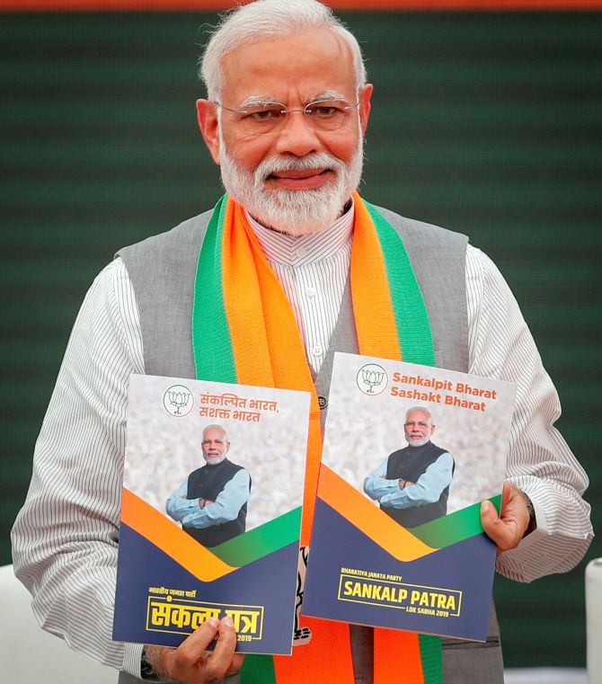 BJP releases manifesto: 75 promises for India @75 - Rediff.com India News