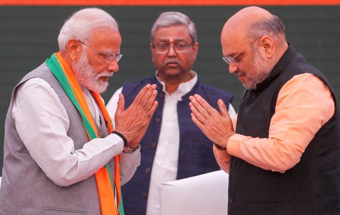 BJP Releases Manifesto: 75 Promises For India @75 - Rediff.com India News