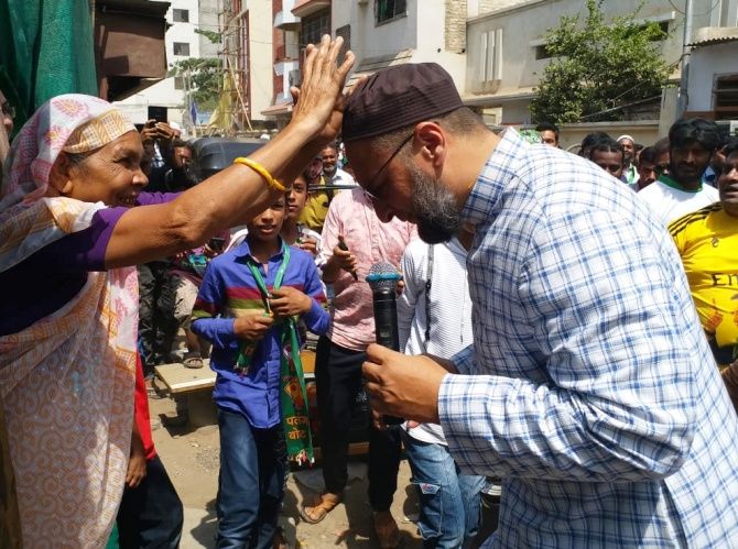 Asaduddin Owaisi is blessed by a voter during his padyatra in Aurangabad. Photograph: SnapsIndia