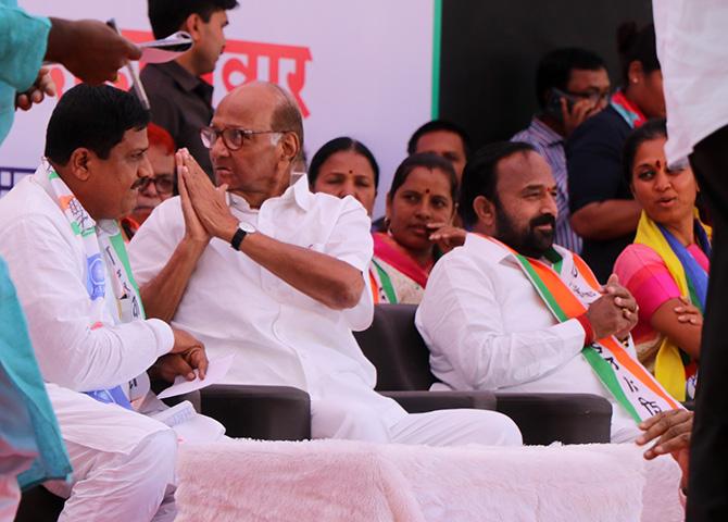 The Pawar and Sule clan on stage. Photograph: Rajesh Karkera/Rediff.com.