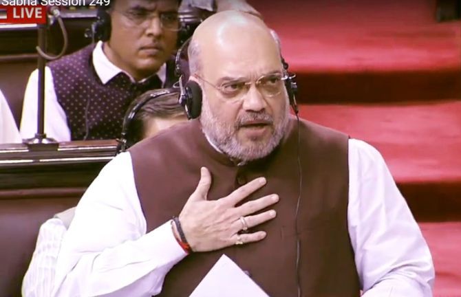 Home Minister Amit Shah introduces the resolution scrapping Article 370 in the Rajya Sabha on August 5, 2019. Photograph: ANI Photo