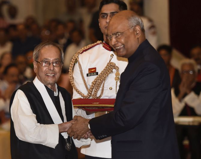 President Ram Nath Kovind confers the Bharat Ratna upon former President Pranab Mukherjee at Rashtrapati Bhavan, August 8, 2019. Photograph: Kamal Singh/PTI Photo