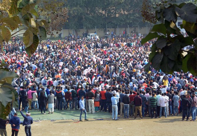 A peaceful protest against the Citizenship Amendment Act despite a curfew in Guwahati. Photograph: PTI Photo