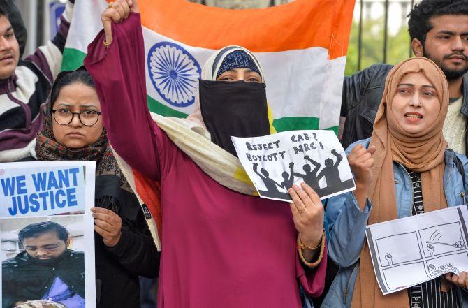 Anti-CAA protest outside Jamia continues for 8th day - Rediff.com India ...