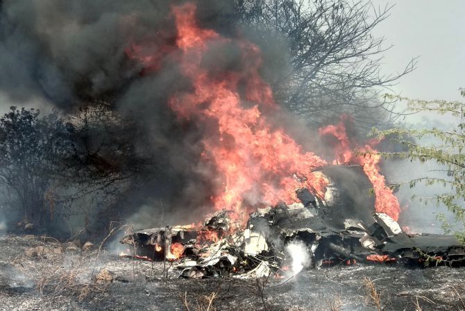 Smoke and fire billow after an Indian Air Force's Mirage 2000 trainer aircraft crashed in Bengaluru, February 1, 2019. Photograph: Ismail Shakil/Reuters