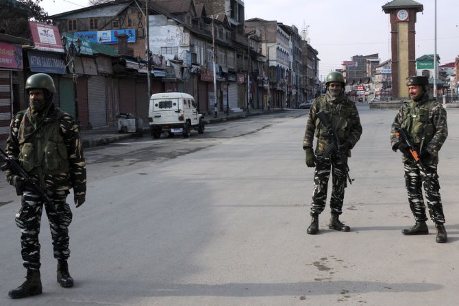 Security personnel guard a blocked road during a strike called in Srinagar during Prime Minister Narendra Damodardas Modi's visit, February 3, 2019. Photograph: Umar Ganie for Rediff.com