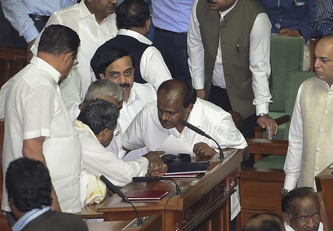 Cong-JD-S govt a case of can't stay together, can't live apart?