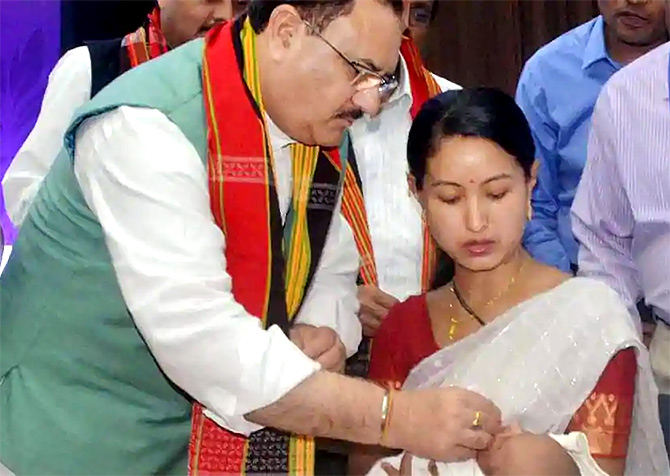 Then Union health minister Jagat Prasad Nadda administers the rotavirus vaccine in Agartala. Photograph: PTI