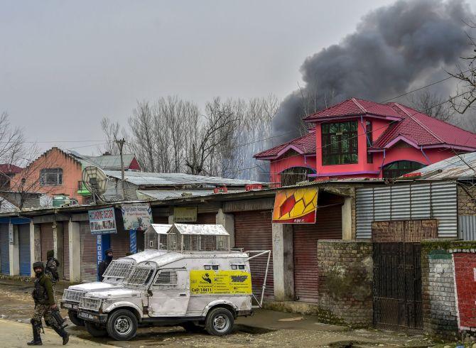 Soldiers at the site of an encounter with terrorists in Pulwama, south Kashmir, February 18, 2018. Photograph: Umar Ganie for Rediff.com