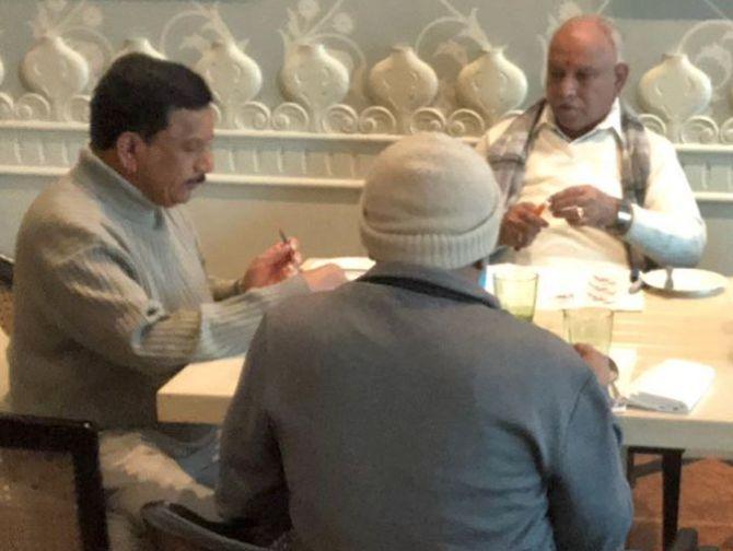 IMAGE: Karnataka's Bharatiya Janata Party leader Bookanakere Siddalingappa Yeddyurappa and other party leaders at a hotel in Gurugram. Photograph:ANI/Twitter