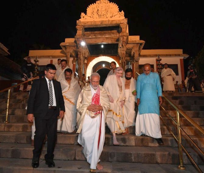 Shashi Tharoor says he was not allowed into temple with PM Modi - Rediff.com