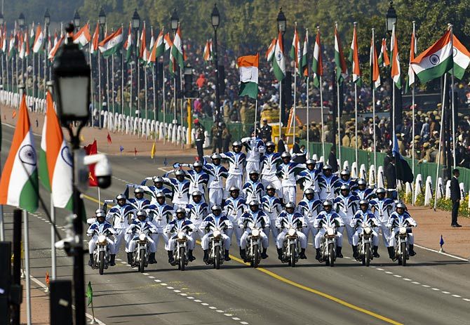 33 Daredevils of the Indian Army's Corps of Signals motorcycle team display their skills on 9 motorcycles during the Republic Day parade. Photograph: Photograph: Kamal Kishore/PTI Photo