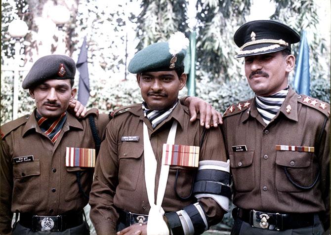 Param Vir Chakra awardees then Rifleman Sanjay Kumar, left, and then Grenadier Yoginder Yadav, centre, with Mahavir Chakra awardee then Lieutenant Balwan Singh, right. Grenadier Yadav and Lieutenant Balwan Singh were in the commando platoon that led the final assault on Tiger Hill. Their bravery that night is the stuff of legend. Photograph: Rediff.com