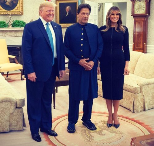 Pakistan Prime Minister Imran Khan, centre, flanked by United States President Donald John Trump and his wife Melania Trump. Photograph: Kind courtesy FLOTUS/Twitter