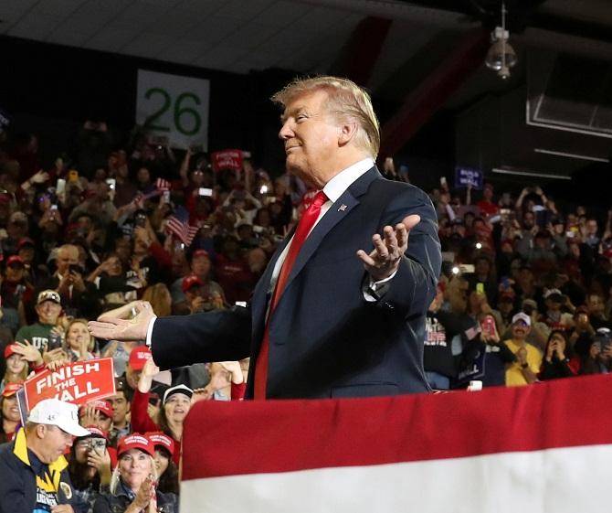 US President Donald Trump gestures to supporters in Texas, US. Photograph: ANI Photo