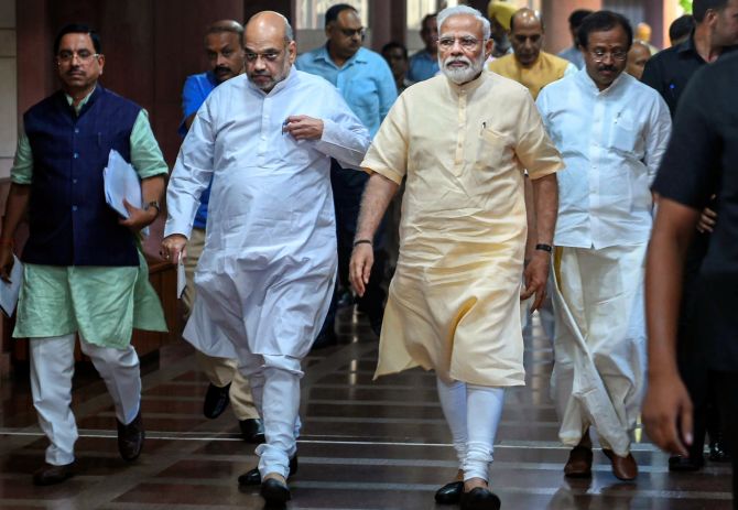 Prime Minister Narendra Damodardas Modi, Union Home Minister and Bharatiya Janata Party President Amit Anilchandra Shah and other BJP leaders leave after an National Democratic Alliance meeting at the Parliament library in New Delhi, June 16, 2019. Photograph: Shahbaz Khan/PTI Photo