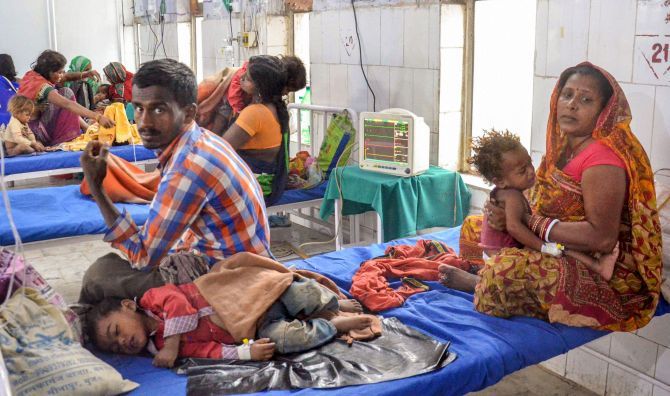 Children suffering from Acute Encephalitis Syndrome being treated at a hospital in Muzaffarpur. Photograph: PTI Photo