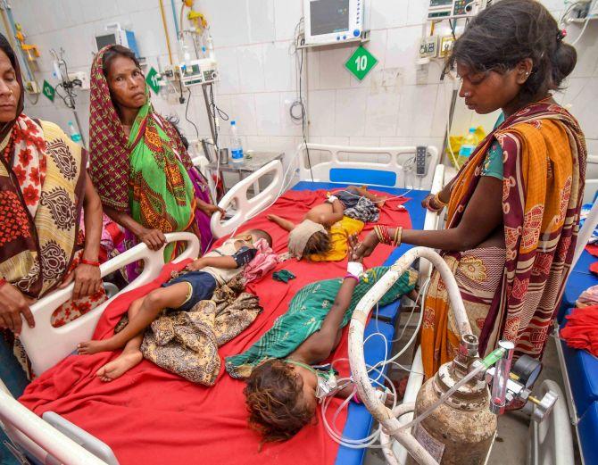 Children showing symptoms of acute encephalitis syndrome undergoing treatment at the Sri Krishna Medical College and Hospital in Bihar's Muzaffarpur. Photograph: PTI Photo