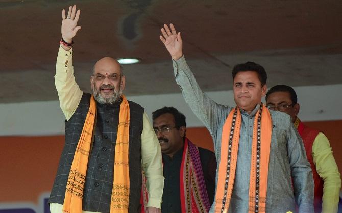 Bharatiya Janata Party President Amit Anilchandra Shah and BJP national Secretary Sunil V Deodhar at a rally at the Swami Vivekananda maidan in Agartala, January 5, 2019. Photograph: PTI Photo