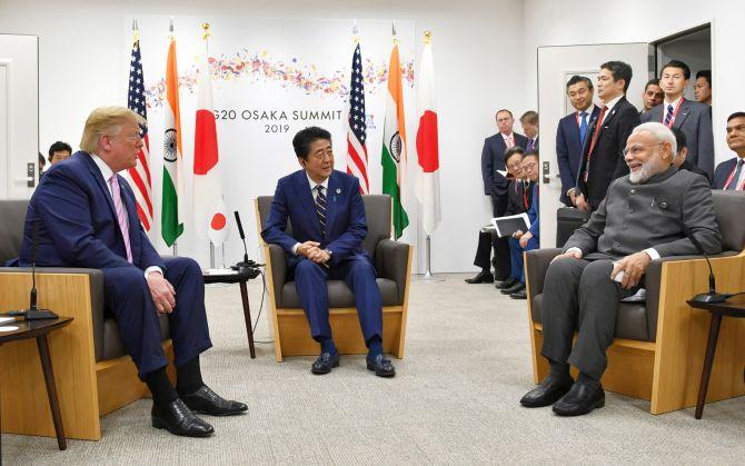 Prime Minister Narendra Damodardas Modi with US President Donald J Trump and Japanese Prime Minister Abe Shinzo meet ahead of the G-20 summit in Osaka, January 28, 2019.