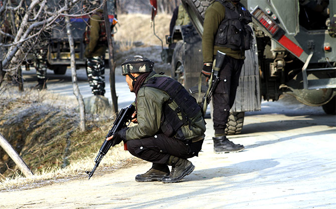 Soldiers at the site of an encounter with terrorists in Pulwama, south Kashmir, December 28, 2018. Photograph: Umar Ganie for Rediff.com