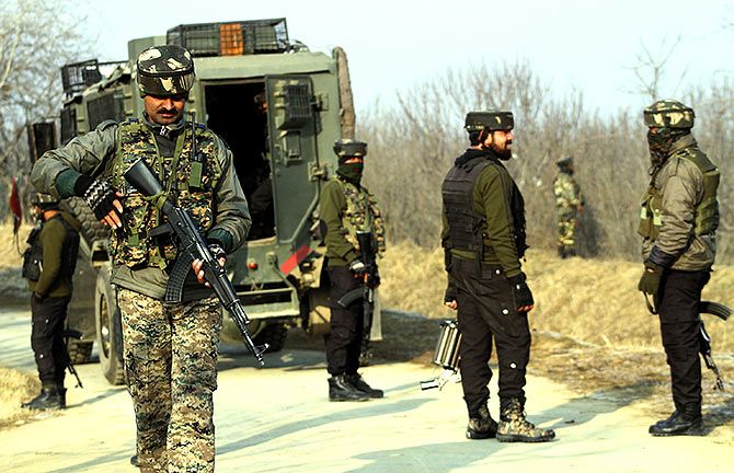 Soldiers at the site of an encounter with terrorists in Pulwama, south Kashmir, December 28, 2018. Photograph: Umar Ganie for Rediff.com