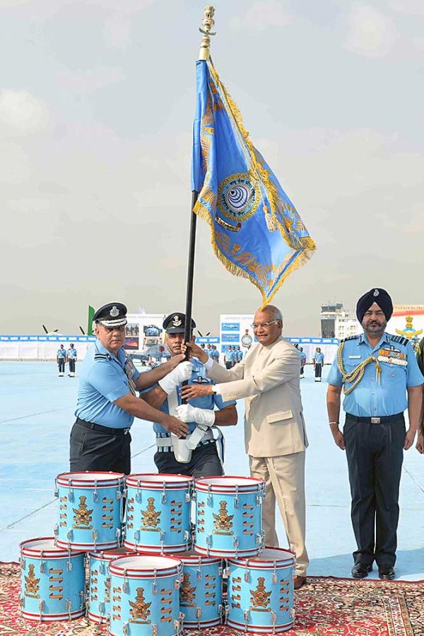 Air Chief Marshal Birender Singh Dhanoa, seen right, as President Ram Nath Kovind, supreme commander of the armed forces, presents colours to Air Force Station, Hakimpet, and 5 Base Repair Depot at the air force station, Sulur, Coimbatore, March 4, 2019. Photograph: Rashtrapati Bhavan