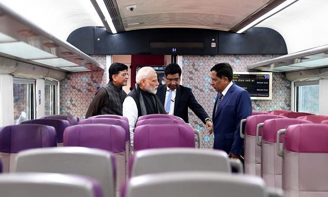 Prime Minister Narendra Damodardas Modi inspects the Vande Bharat Express at New Delhi Railway Station on February, 15, 2019. Union Minister for Railways and Coal Piyush Goyal and Chairman, Railway Board, Vinod Kumar Yadav are also seen. Photograph: ANI Photo