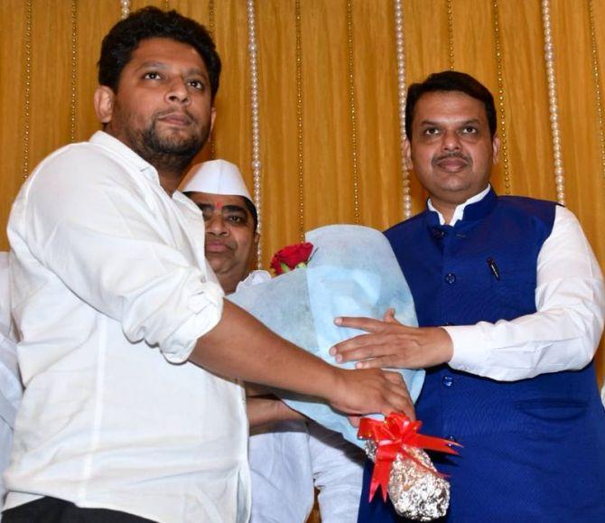 Maharashtra Chief Minister Devendra Fadnavis, right, welcomes Dr Sujay Vikhe Patil into the Bharatiya Janata Party. Photograph: Kind courtesy @BJP4Maharashtra/Twitter