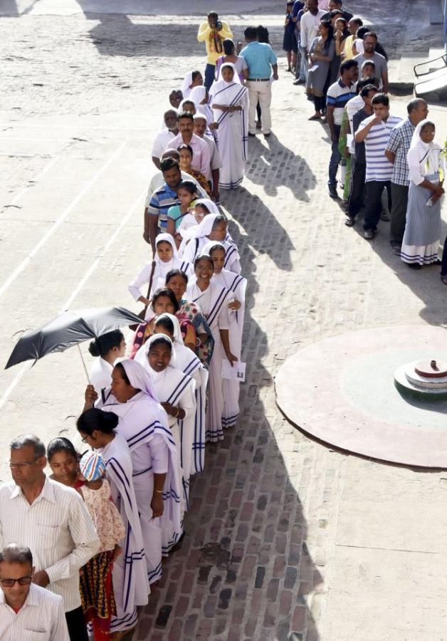 Voters wait to cast their vote at a polling station in Ranchi, May 6, 2019. Photograph: PTI Photo